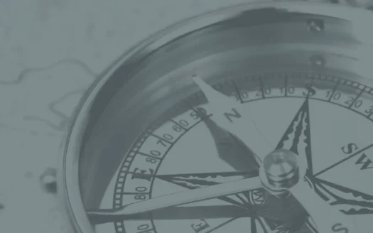 Compass symbolizing direction in commercial real estate investment strategy with guidance from a Commercial Realtor®